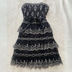 Black And Ivory Lace Tiered Party Dress/Evening Dress/Black Tie With Beautiful Detailing. Strapless, Fitted Top With Slightly Flared Skirt Created By Multiple Under-Layers. Knee Length. Tiers Are Subtle/Small. Bcbgmaxazria, Size 2. Excellent Condition. Evening Dress Black, Black Evening Dresses, Fitted Top, Dress Evening, Ivory Lace, Flared Skirt