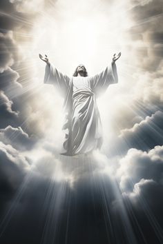 the statue of jesus surrounded by clouds and sun beams in front of him with his arms outstretched