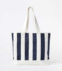 Effortless, roomy, and perpetually chic, this striped tote is our new favorite weekend companion.,Imported:Imported,Fabrication:100% Cotton Loft Striped Weekender Bag Blue/White Combo Women's by Loft Size Regular - One Size Blue/White Combo Women's Bags, &, Clutches, Totes, Gifts, 100%, Cotton Striped Canvas Shoulder Bag For Shopping, Chic Striped Tote Bag, Striped Canvas Shopping Bag, Chic Everyday Striped Bags, Striped Double Handle Shopping Bag, White Tote Bag With Striped Lining, Striped Canvas Tote Shoulder Bag, Striped Tote Bag For Shopping, Chic Striped Shoulder Bag For Shopping