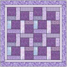 a purple and white quilt with squares on it