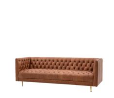 a brown leather couch with gold legs and buttons on it's back, against a white background