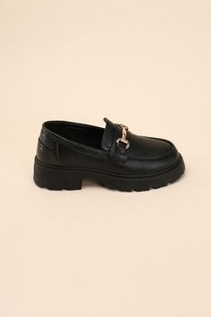 A blend of sophistication and comfort for your footwear collection. These loafers feature a classic horse-bit detail and a platform sole, combining timeless style with a trendy lift. The loafer design offers a polished look that's suitable for both casual and dressy occasions. Horse-bit detail Heel Height: 1.5" Width: Regular Toe: Closed, round Heel shape: Platform, flat Material: Synthetic Imported. Care Instructions: Use a soft cloth and a little lukewarm water to clean the footwear after use. Fall Must Haves, Bit Loafers, China Style, Horse Bits, Platform Loafers, Footwear Collection, Black Platform, China Fashion, Polished Look