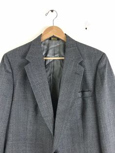 "-Description- >men's gray plaid sport coat >two button front >three buttons on the cuffs >two flap close and one open pocket on the front >vent in the back >partially lined >size 40 >so preppy! >condition: great >color(s): gray >fabric(s): wool >brand: botany 500 >care: dry clean -Measurements- >size: 40 ✩ all measurements are taken with the item laying flat & some sizes are estimates so please check measurements ✩ chest: 42\" / 107cm length: 30\" / Tailored Gray Blazer, Classic Gray Blazer With Button Closure, Classic Gray Blazer With Welt Pockets, Classic Gray Sport Coat With Pockets, Gray Sport Coat With Welt Pockets For Office, Gray Sport Coat For Formal Fall Occasions, Gray Formal Sport Coat For Fall, Gray Sport Coat With Welt Pockets And Suit Collar, Business Gray Sport Coat With Lapel Collar