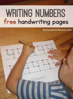 a young boy writing numbers on a sheet of paper with the words free handwriting pages