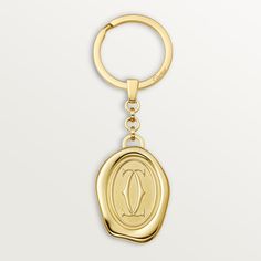 Cartier - Key ring Double C Logo - Key ring Woman Metal - Keyring with golden-finish wax seal motif. Medallion dimensions: 1.35” high x 1” wide Trinity Bracelet, Cartier Earrings, Cartier Necklace, Rings Collection, C Logo, Bag Charms, Wax Seal, Cartier Ring, Personalized Accessories