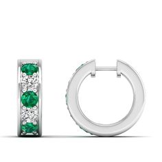 These exquisite emerald and diamond hoop earrings are a stunning addition to any jewelry collection. Crafted with precision and attention to detail, the vibrant emeralds are elegantly complemented by the sparkling diamonds, creating a luxurious and sophisticated look that is perfect for any occasion. Metal: 14K Gold Setting Type: Prong Rhodium Finish: Yes, on White Gold Gemstone Details: Gemstone: Emerald Shape: Round Average Dimensions: 3.00 MM Quantity: 06 Average Cut: Very Good Average Color: Diamond Huggies, Dance Jewelry, Birthstone Gifts, Ring Pendant Necklace, Diamond Hoop Earrings, Sparkle Diamonds, Mens Wedding Bands, Bridal Rings, Wedding Men