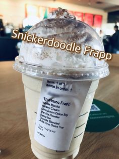 an ice cream sundae in a plastic cup with the words stickerdoodle frapp on it