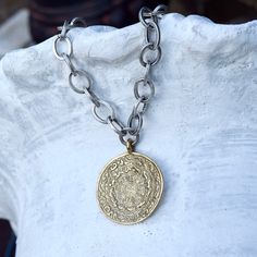 This is a antiqued solid Brass Chinese zodiac pendant on oxidized Pewter chain with a Pewter hook  enclosure. The necklace is adjustable up to  18 inches long and the pendant adds another 2 inches. (N1779) Silver Brass Medallion Necklace With Adjustable Chain, Symbolic Brass Medallion Necklace, Silver Brass Amulet Coin Necklace, Bronze Medallion Jewelry With Oxidized Finish, Bronze Oxidized Medallion Jewelry, Bronze Oxidized Finish Medallion Jewelry, Symbolic Medallion Necklace With Oxidized Finish, Bronze Medallion Necklace With Coin Pendant, Bronze Medallion Necklace With Oxidized Finish