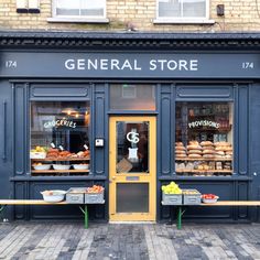 a store front with many different types of food on display