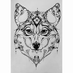 a black and white drawing of a fox's head with ornate details on it