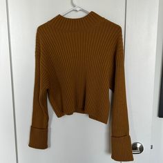 Never Worn, Perfect Condition. Cropped Sweater. Darker Brown Mustard Color Yellow Ribbed Sweater For Fall, Yellow Ribbed Sweater For Winter, Trendy Yellow Stretch Sweater, Yellow Ribbed Long Sleeve Sweater, Yellow Cropped Tops For Fall, Cropped Yellow Tops For Fall, Yellow Long Sleeve Ribbed Sweater, Trendy Mustard Long Sleeve Sweater, Casual Yellow Ribbed Sweater