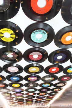 an array of records hanging from the ceiling