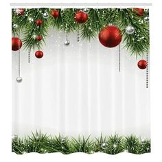 a christmas shower curtain with ornaments hanging from it