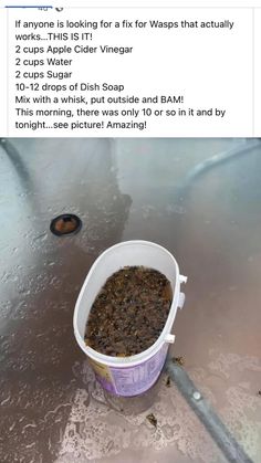 a bucket filled with liquid sitting on top of a table