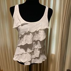 Aeropostle White Ruffle Tank. Nwot. Never Worn. Casual Tiered Ruffle Tops, Casual White Tiered Top, White Tiered Casual Tops, Casual Fitted Tiered Top, Chic Tiered Cotton Top, Casual Cotton Tiered Top, Casual Tiered Cotton Top, Cotton Tiered Top For Day Out, Tiered Cotton Tops For A Day Out