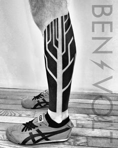 black and white photograph of legs with trees on them, as well as the words between them