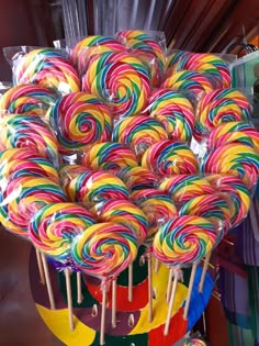 many lollipops are stacked on top of each other