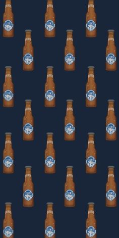 many bottles of orange juice on a dark blue background with the words nathan's written in white