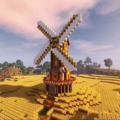 an image of a windmill in the middle of a field