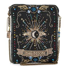 PRICES MAY VARY. Celestial Charm: Channel the enchanting allure of the moon with our Moonstruck Mini Crossbody Handbag, inspired by tarot imagery and featuring captivating beadwork that reflects the mystical beauty of the night sky. Versatile Wear: Enjoy the flexibility of our removable crossbody chain strap, allowing you to effortlessly transition from day to night while carrying the celestial energy of the moon with you wherever you go. Secure Storage: Keep your essentials safe and organized w Magic And Mystery, Mary Frances, Purse Gift, Best Handbags, Handmade Purses, Top Handle Handbags, Crossbody Clutch, Metal Logo, Mini Crossbody