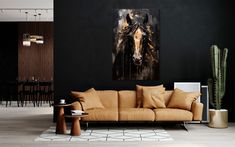 a living room filled with furniture and a large painting on the wall above it's head