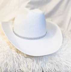 White Rhinestone Cowboy Hat. This cowboy hat is great for parties, events, and even cute photos! This is an adult sized, felt cowboy hat. (One size fits most). The hat circumference is 23 inches. We hope you will love this stunning hat as much as we do! No returns offered. Love, The Disco Cowgirls💋 Rhinestone Cowboy Hat, White Cowboy Hat, Rhinestone Cowboy, Adidas Hat, Felt Cowboy Hats, Chapeau Cowboy, Pink Beanies, Cowgirl Hat, News Boy Hat