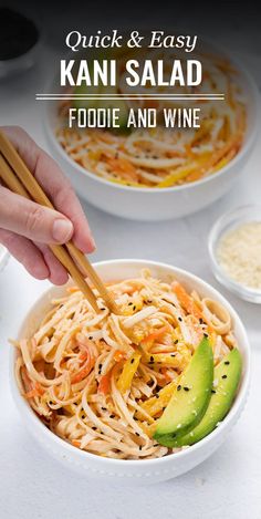 a person holding chopsticks over a bowl of food with noodles and avocado