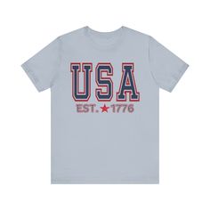 USA JULY 4th LAND T-SHIRT Buttery Soft Bella & Canvas Unisex Adult Sizing - See Size Chart PRINT This is Direct-To-Garment printed item, will not peel or crack like vinyl. The ink is printed INTO the fabric, not sitting on top of it. WASHING INSTRUCTIONS Wash inside out, cold water, gentle Tumble dry low or air dry Do not use bleach or fabric softeners. Avoid ironing on the design, do not dry clean. SIZE See specific sizing chart in photos These are unisex and not ladies or fitted. If you want a Blue Graphic Tee For Independence Day, 4th Of July Cotton T-shirt With Text Print, Blue T-shirt With Text Print For 4th Of July, Blue Text Print T-shirt For 4th Of July, Graphic Tee T-shirt With Letter Print For Independence Day, Blue Independence Day Top With Letter Print, Independence Day Graphic Tee With Letter Print, Independence Day Blue Tops With Letter Print, Blue Tops With Letter Print For Independence Day