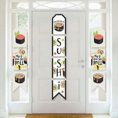 sushi party door banner hanging on the front door