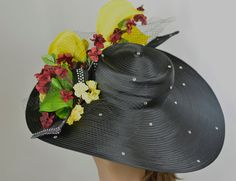 "It is my own unique design . Vogue hats are perfect for horse racing events, church, the Kentucky derby, weddings, garden tea parties and charity events. This hat is a little heavy. 100% Brand new, hand made and high quality. Size: One size / Adjustable inner band. Material: Satin Brim: approx. 8.5\" THIS HAT IS NOT RETURNABLE AND IS NON-REFUNDABLE. Please feel free to ask me any questions or special requests. All pieces are securely wrapped & boxed to prevent damage/breakage. Please visit Black Hat For Garden Party In Spring, Black Brimmed Mini Hats For Garden Party, Black Mini Hats For Kentucky Derby Garden Party, Black Summer Fascinator For Garden Party, Black Mini Hats For Kentucky Derby, Summer Black Fascinator For Garden Party, Black High Crown Top Hat For Spring, Spring Black Top Hat With High Crown, Black High Crown Top Hat