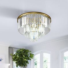 a living room filled with furniture and a chandelier