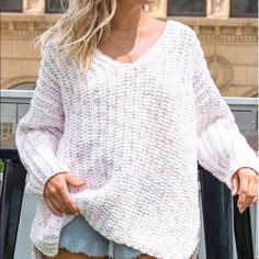 V-Neck Oversized Knit Sweater. White With Multi-Color Through The Sweater. Soft Knit V-neck Sweater For Spring, Spring Acrylic V-neck Top, Casual White Chunky Knit V-neck Sweater, Casual Soft Knit V-neck Sweater For Spring, Spring Casual Open Knit V-neck Sweater, Casual Open Knit V-neck Sweater For Spring, Casual Spring V-neck Open Knit Sweater, Spring V-neck Pointelle Knit Sweater, White Knitted V-neck Sweater For Spring