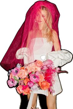 a woman in a white dress holding a pink veil over her head and wearing high heels