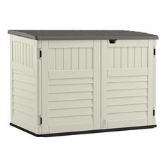 an outdoor storage shed with the door open and two doors closed to reveal it's side