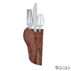 a knife, fork and spoon holder made out of brown leather with floral designs on it