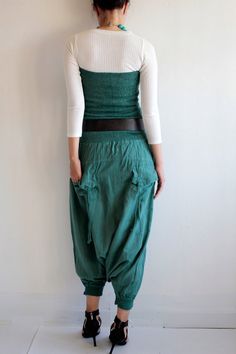 "Our new spring/summer beauty! Beautiful tube top all the way to the waist line. Shirring smock with double layer fabric, not see through. Same design back and front. The bottom part is drop crotch style pants. Roomy. 2 side pockets. 2 back pockets with ties. The bottom part is elastic hem. You can adjust to capris lenght or shorts lenght. Can be worn many ways. 1. Wear as a tube top. 2. Wear as a high waist pants with other top piece. You can also wear inside with a jacket over. with belt or wi Womens Jumpsuits, High Waist Pants, Style Pants, Summer Beauty, Waist Pants, High Waisted Pants, Tube Top, Jumpsuits For Women, Double Layer