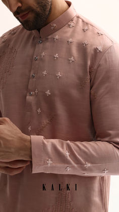 Look at this astonishing pink kurta set.
The kurta set is fabricated from silk fabric and the intricate handwork makes it faboulous.
This set is good to go for all kinds of festive events and gatherings.
The ensemble comes with a kurta and a bottom. Panjabi Design, Silk Kurtas, Pink Kurta, Kurta Set For Men, Kurta Men, Mens Kurta Designs, Mens Kurta, Silk Kurta, Indian Fashion Dresses