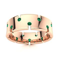 A beautfiul flush set Emerald in 14k Rose Gold band for men has a unique design. This captivating ring features multiple round diamonds all around the ring. We only use Natural AAAA Emeralds which are the top 15% of all real / genuine Emeralds available. They are rich green, moderately to slightly included and exhibit high brilliance. This quality is typically used in fine jewelry by the 5th Avenue or Rodeo Drive Jewelers. Gold Band For Men, Rodeo Drive, 5th Avenue, Rose Gold Band, Rich Green