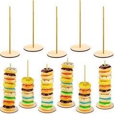 PRICES MAY VARY. What you get: one package contains 5 pieces of wood donut display holders, enough quantity for your party supplies; Size: each donut stand holder is approx. 11.6 inches in length, can hold approx. 6 - 8 doughnuts Durable material: these doughnut stands are made of wood material, solid and delicate work, which ensures it has smooth surface, nice party decoration for your use Party supplies: these donut display holders can make your table more attractive and impressive, great deco Donuts Wall, Doughnut Stand, Cake Pop Displays, Donut Display, Donut Stand, Wall Stand, Sweet Carts, Birthday Party Desserts, Party Setup