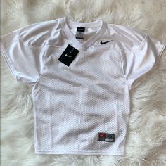 This Is A Brand New White Mesh Little Boys Jersey From Nike. Style 395272 Color 100. Black Nike Swoosh Logo. White Nike T-shirt For Game Day, Nike White T-shirt For Game Day, White Fitted T-shirt With Team Spirit, Nike White Sports Top, White Tops For Game Day And Sports Season, White Tops For Game Day, White Team Spirit Sports Top, White Sports Top With Team Spirit, Game Day White Top With Team Name