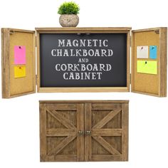 the magnetic chalkboard and corkboard cabinet is next to a potted plant