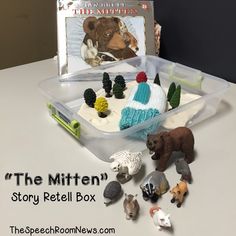 the mitten story retell box is filled with toy animals and other small toys