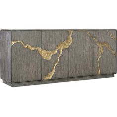 the sideboard is made out of wood and has gold leaf designs on it's sides