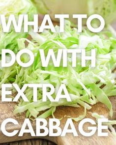 cabbage on a cutting board with the words what to do with extra cabbage over it