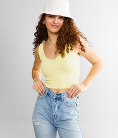 Free People Ribbed Brami Tank Top - Green/Yellow M/L, Women's Mintedlemonade Cropped v-neck tank Bust measures 23 on size XS/S Body length 15 on size XS/S Model Info: Height: 5'5 1/2 | Bust: 31 1/2 | Waist: 24 | Hip: 35 | Wearing Size: XS/S. 50% Rayon, 45% Nylon, 5% Spandex. Machine wash cold, gentle cycle. Non-chlorine bleach. Lay flat to dry. Do not iron.. Measurements: Bust -Fullest part of bust with arms at sides. Waist -Circumference of natural waist: above belly button, below rib cage. Hip Yellow Ribbed Sleeveless Tank Top, Yellow V-neck Tank Top For Beach, Casual Yellow Tank Crop Top, Yellow V-neck Tank Top For Summer, Casual Yellow Tank Top For Spring, Yellow V-neck Tank Top For The Beach, Tank Top For Women, Simpler Lifestyle, High Intensity Interval Training