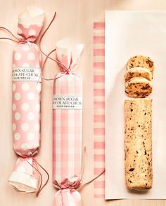 some cookies wrapped in pink and white paper