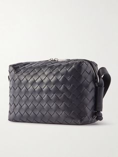 Bottega Veneta famously eschews logos, letting its time-honoured craftsmanship speak for itself. This messenger bag has been made in Italy using the label's signature intrecciato weave, a motif instantly recognisable to those who speak the language of quiet luxury. Modern Leather Satchel With Intrecciato Weave, Classic Rectangular Bag With Intrecciato Weave, High-end Rectangular Bag With Leather Lining, Business Intrecciato Weave Crossbody Bag, Luxury Leather Satchel With Intrecciato Weave, Luxury Bag With Intrecciato Weave For Office, Designer Formal Bag With Intrecciato Weave, Luxury Intrecciato Weave Shoulder Bag For Travel, Designer Bags With Intrecciato Weave For Formal