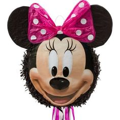 a minnie mouse mask and accessories for a birthday party