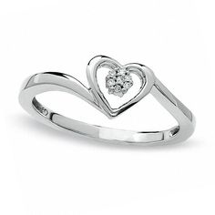 Declare your undying devotion with this stunning Diamond Accent Heart Promise Ring, crafted in elegant 10K white gold. At the center of the beautifully sculpted heart outline, a dazzling composite of round diamonds gleams and shimmers, symbolizing your everlasting commitment. The gracefully bypassing ribbons of the shank add depth and dimension to this exquisite design. Radiant and resplendent, this promise ring is a true celebration of a love that will endure forever.The perfect complement to any elegant style, this ring will be hand-made exclusively to your order by our skilled jewelers. Please allow 7-9 business days for processing.Product ID: GLD-TA-144003Precious Metal Type: 10K White Gold Rhodium: YesRing Style: PromiseColor: J/KClarity: I2/I3Stone Type: DiamondStone Color: WhiteSton Heart Promise Rings Zales, Engagement Rings 4 Carat, Rose Gold Morganite Ring, Heart Promise Rings, Dainty Diamond Ring, Amethyst Ring Engagement, Floral Engagement Ring, Geode Earrings, Silver Heart Ring