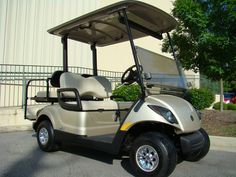 a golf cart parked in front of a building